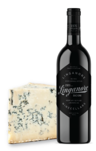 a bottle of Linganore Winecellars Bacioni sits next to a gorgonzola cheese wedge