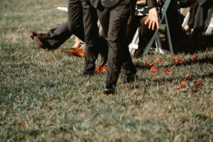 Groomsmen walking down the isle.