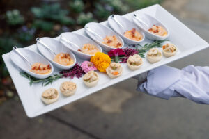 Plated appetizers on sustainable plating.